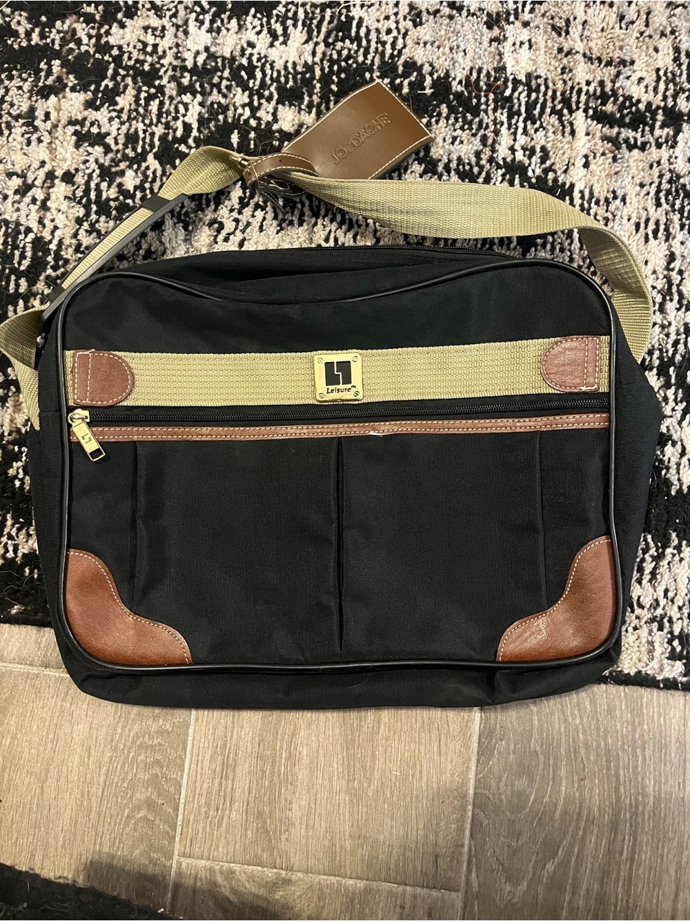 Leisure Traveler Black Canvas Messenger Bag with Brown Accents
